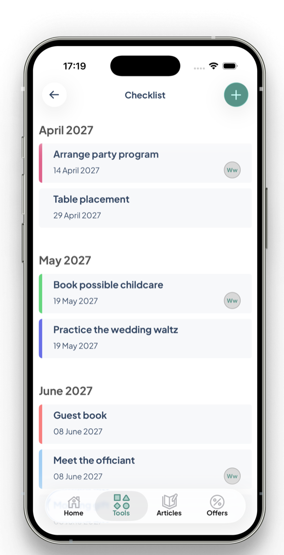 Wevowly checklist screen with wedding tasks grouped by month